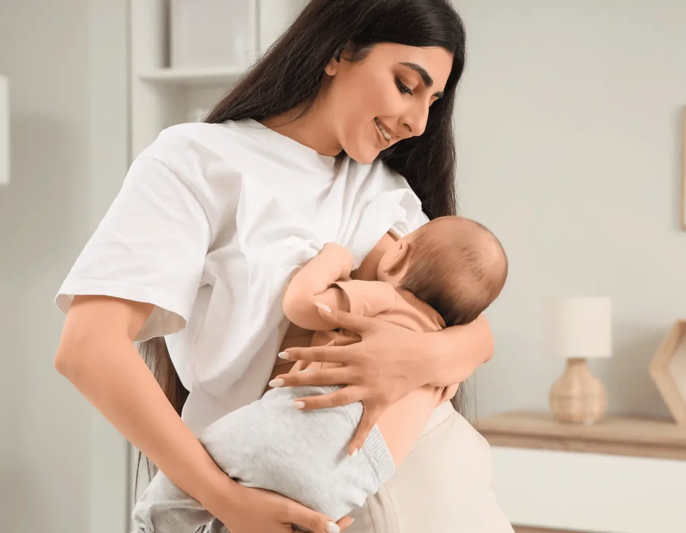 Mother receiving lactation support for breastfeeding latch assessment Perth