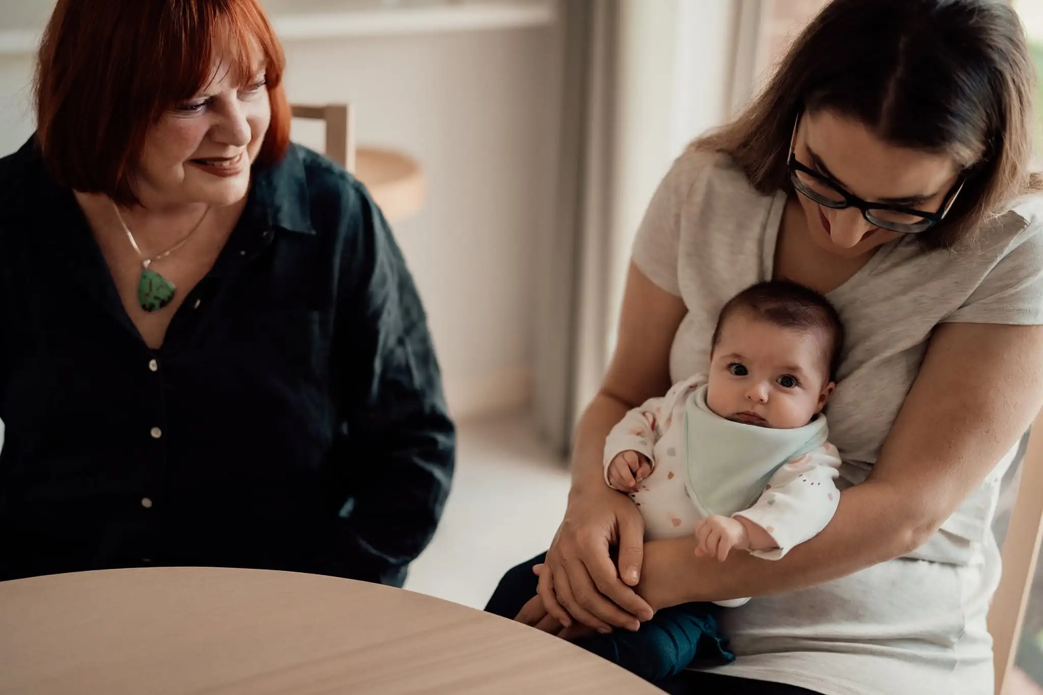IBCLC providing postnatal lactation consulting to new mother in Perth home